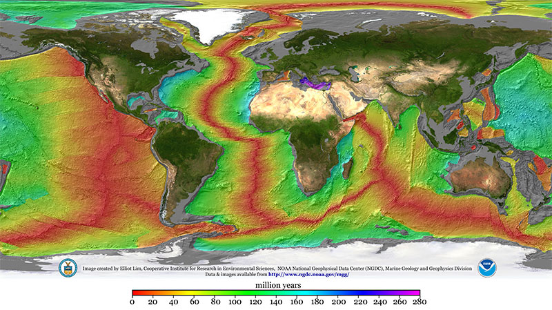 Global map of ocean floor colored by age, showing mid-ocean ridges as red lines