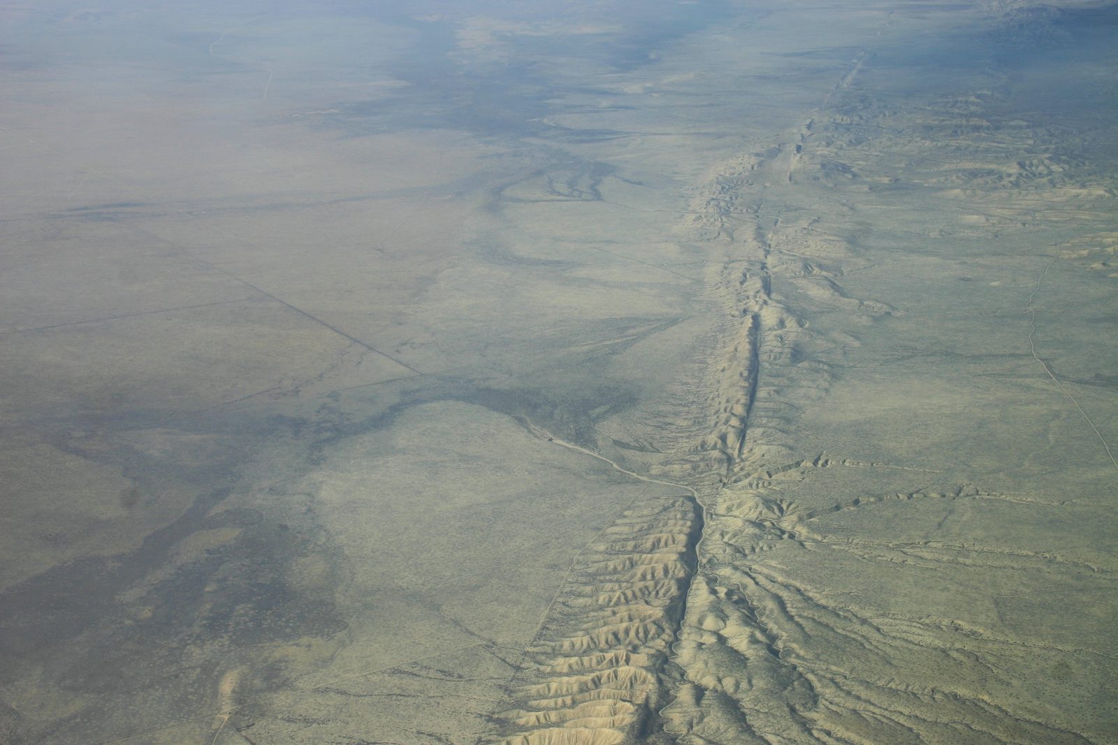 Aerial view of the San Andreas Fault cutting a straight line across the Carrizo Plain in California